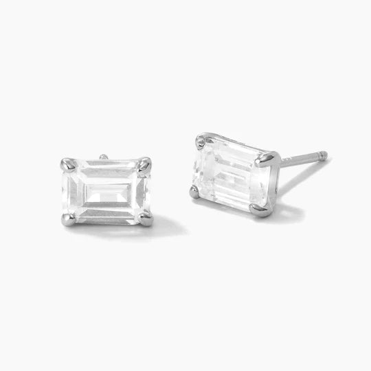 Emerald-cut rectangle stud earrings in a white gold finish