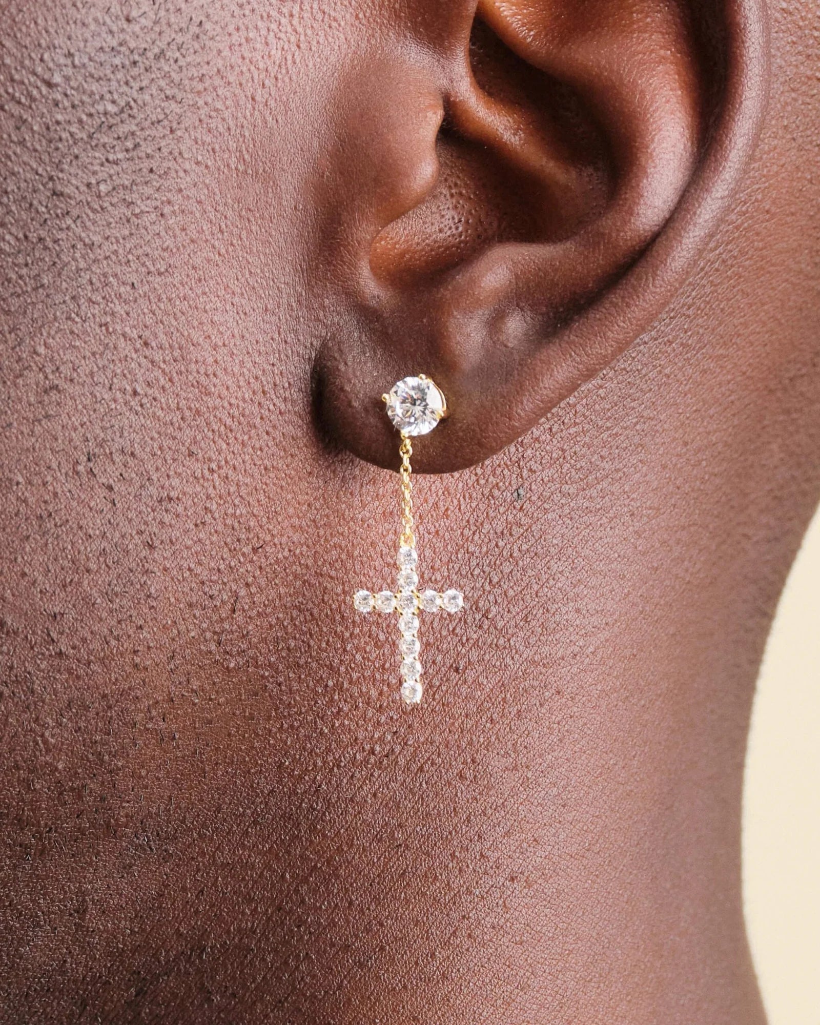 Hanging Cross stud earrings in an 18k gold finish
