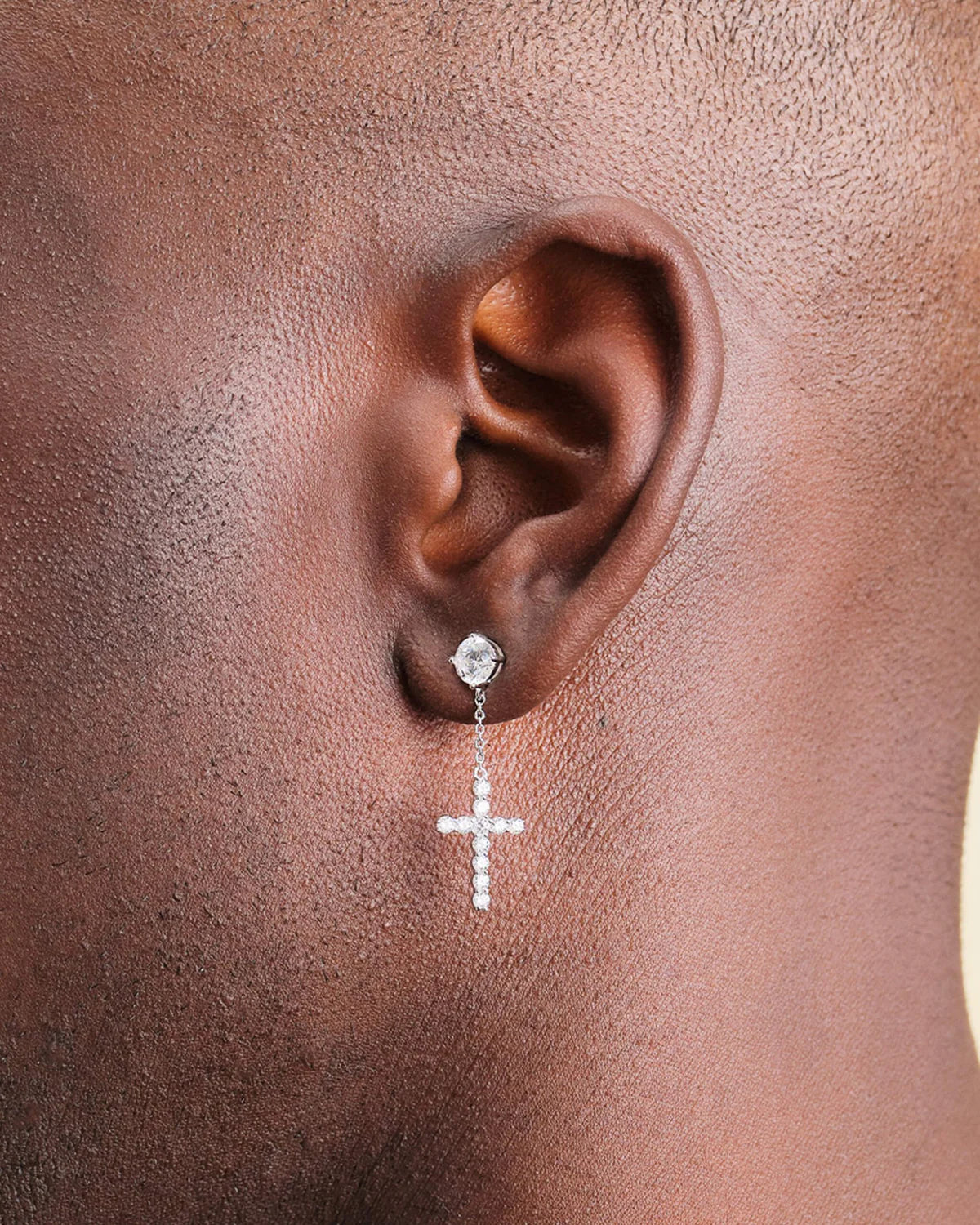 Hanging Cross stud earrings in a white gold finish