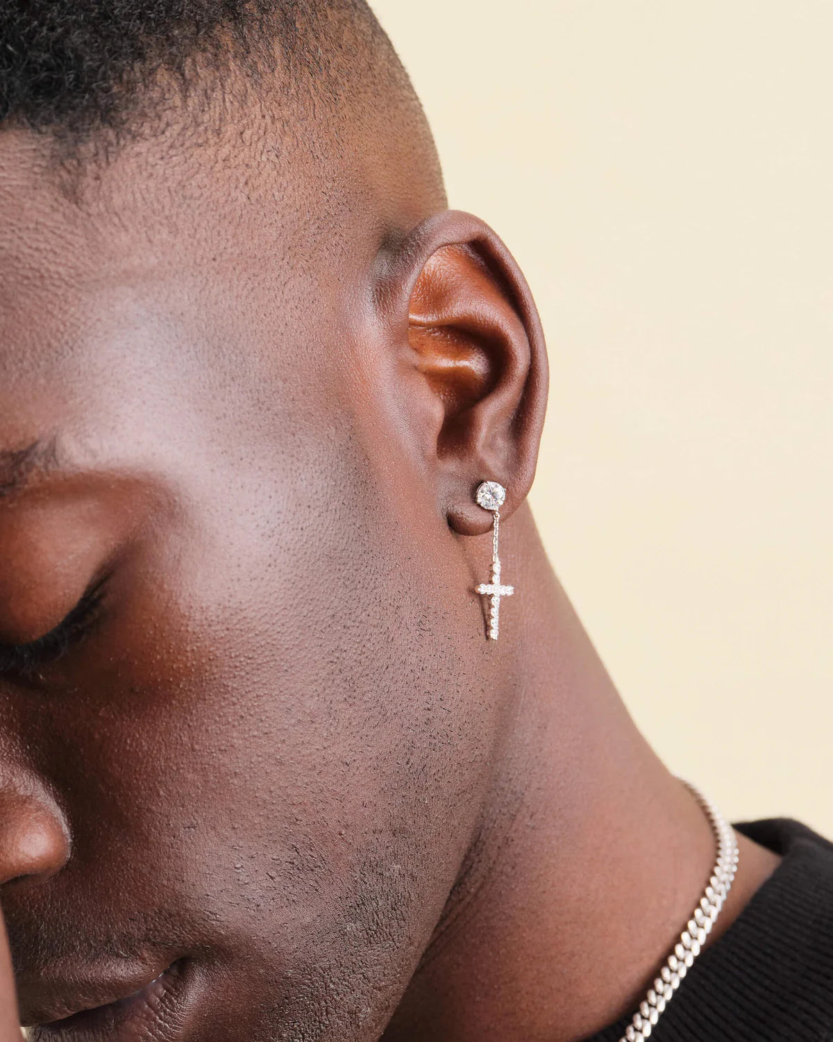 Hanging Cross stud earrings in a white gold finish
