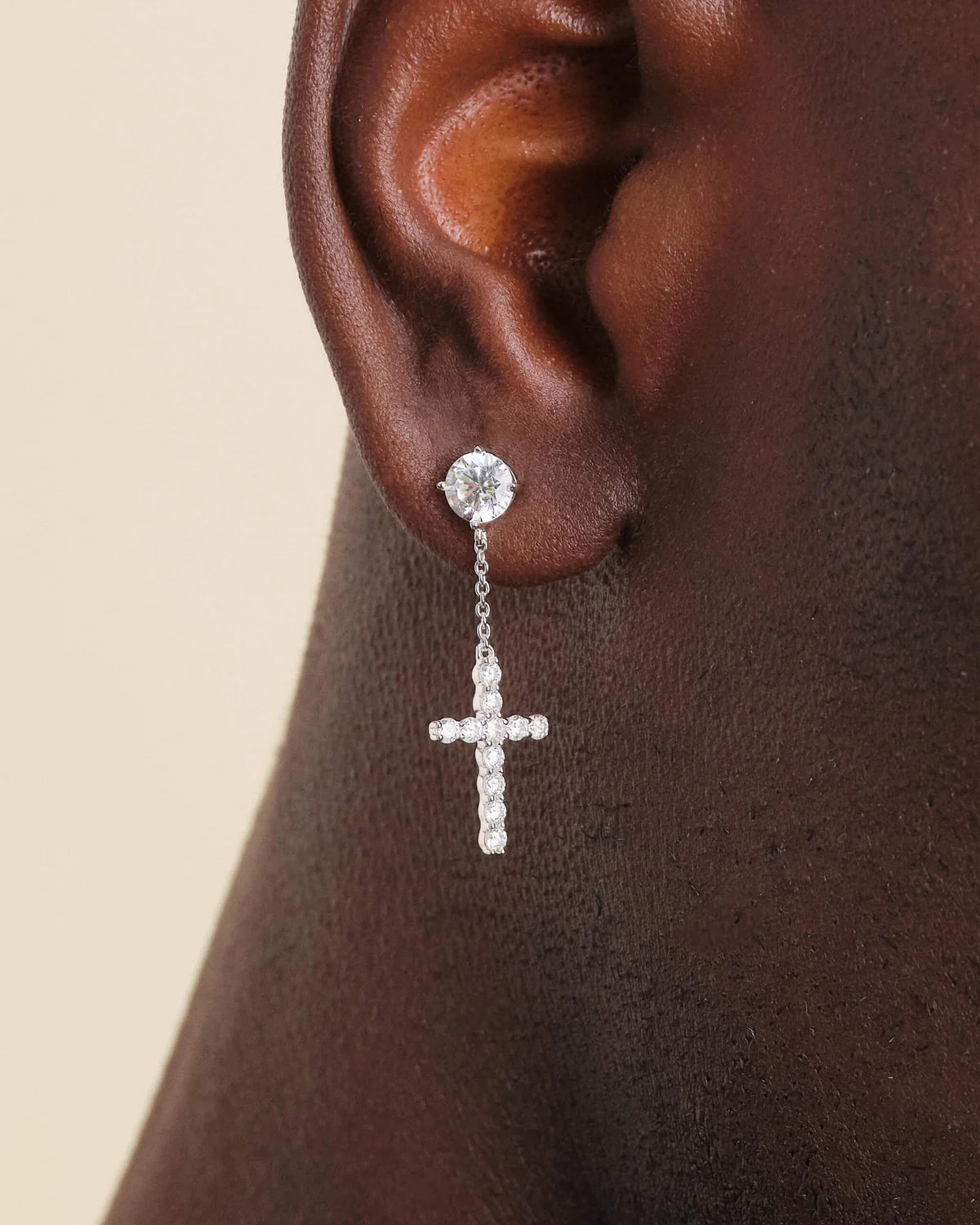 Hanging Cross stud earrings in a white gold finish